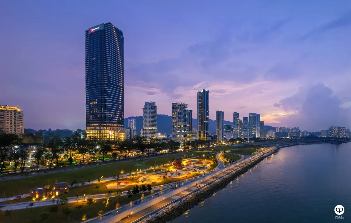 Gurney Bay waterfront and city skyline at dusk