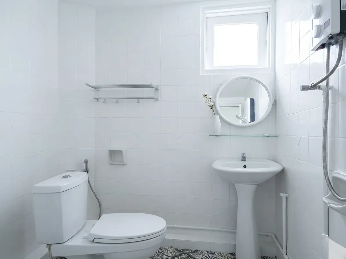 Bright bathroom with shower and basin