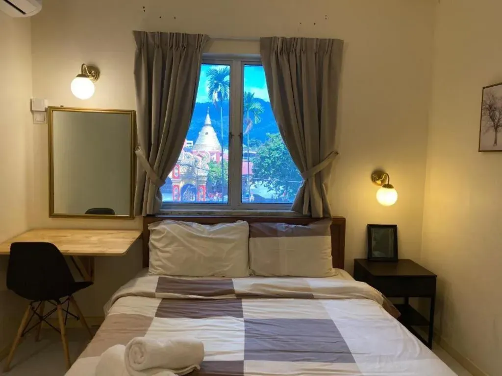 Queen bedroom with window view