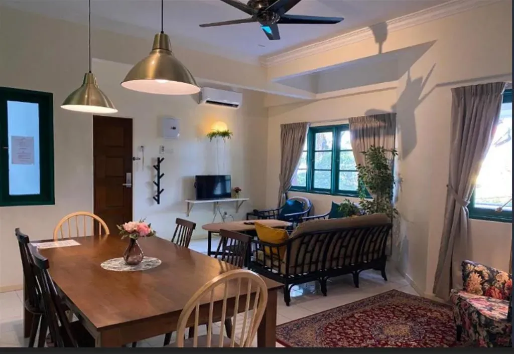 Dining table and lounge in the three bedroom suite