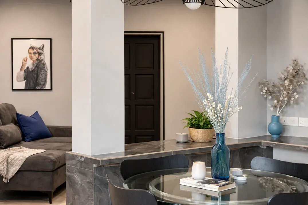 Marble-look counter and glass dining table